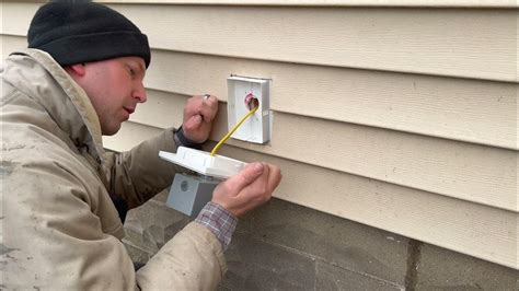 how to install an electric box in vinyl siding|vinyl siding exterior outlet installation.